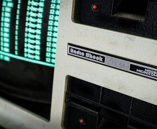 vintage computer with green screen display - motion capture technology for games and film production